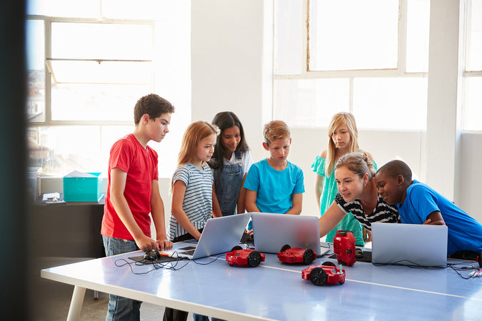 Coding classes for kids - Group Of Students In After School Computer Coding Class