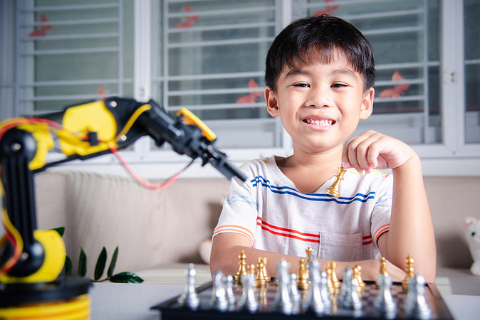 child playing with Robot 