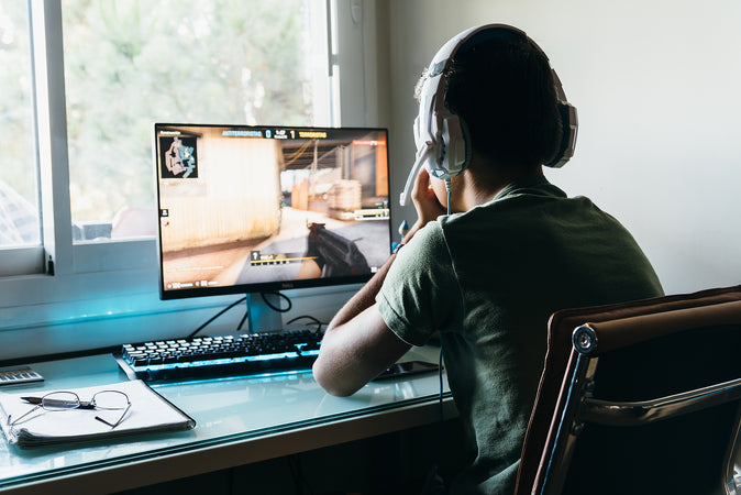 kid playing counter strike
