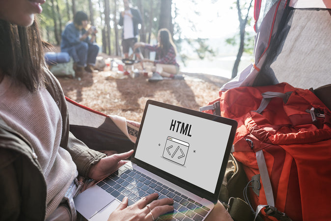girl coding in a camp