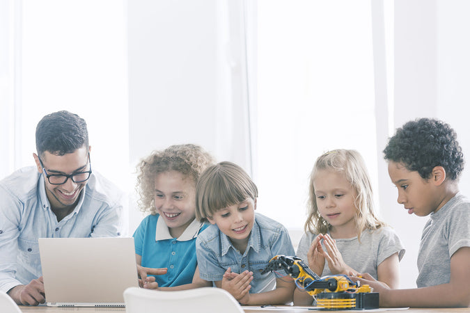 coding classes for kids in London - Primary school students in an extracurricular computer science class