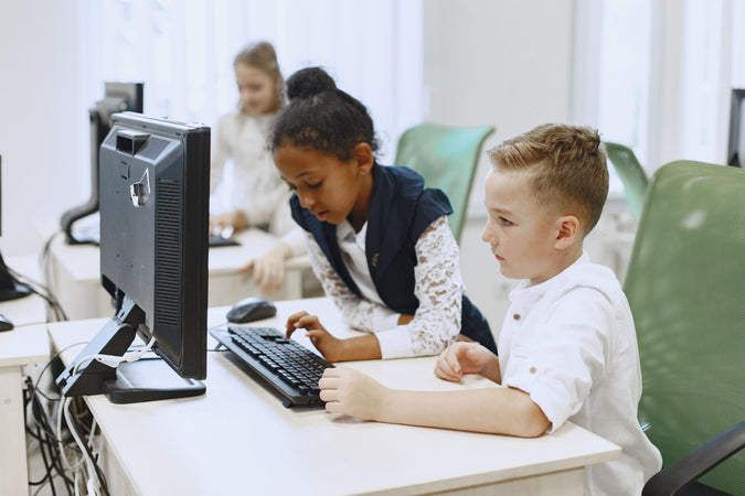coding summer camp london - Boy-Looking-At-The-Computer