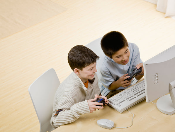 minecraft modding course - Friends holding video game controllers